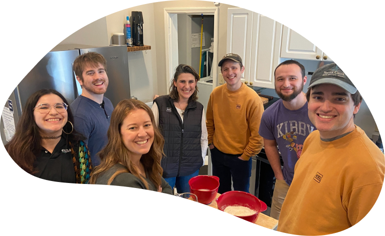 Team sharing bread together